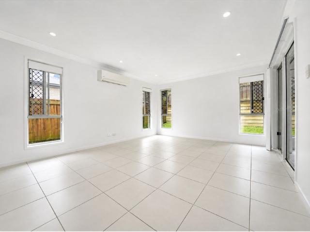 AS NEW FAMILY HOME BACKING ONTO CONSERVATION LAND