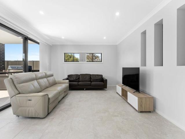 AS NEW FAMILY HOME IDEAL FOR INDOOR/OUTDOOR ENTERTAINING!