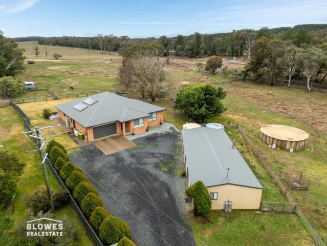 AS NEW HOME ON 5.6 ACRES AND MUCH MORE!