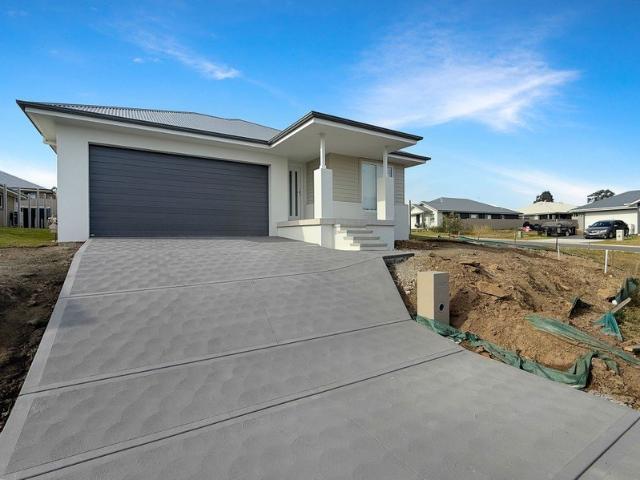 As New McDonald Jones Home Solar, EV Charger, Premium Finishes