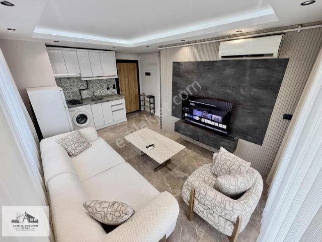 Asmalıevler'de Arakat Balkonlu Klimalı Lüks Kiralık 1+1 Apart