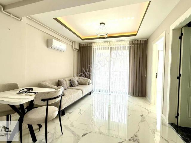 Asmalıevler'de Satılık Cadde Üzerili Arakat Balkonlu 1+1 Apart