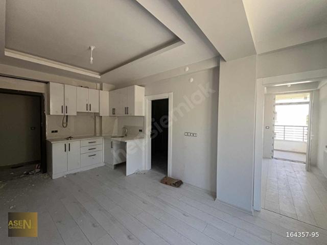 ASEN GAYRİMENKULDEN GÜZELYURT'TA SATILIK İÇİ YAPILI 1+1 DAİRE