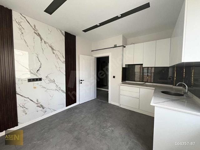 ASEN GAYRİMENKULDEN GÜZELYURT'TA SIFIR KİRALIK 1+1 DAİRE