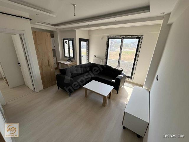 ASİL EMLAK'tan MURADİYE'de SIFIR 1+1 KLİMALI EŞYALI DAİRE