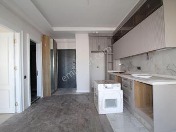 Aslan'dan Mezitli De Havuzlu Site İçi Geniş Peyzajlı Kiralık 1+1