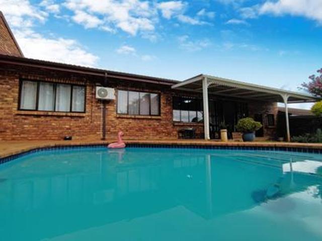 family townhouse in hayfields with a pool