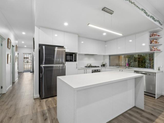 Astutely Priced to Sell Stylish, Low Maintenance Coastal Living