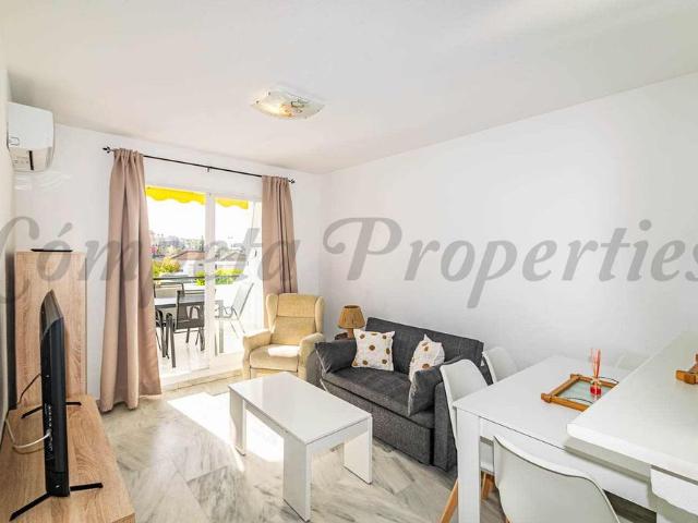 Apartment in Torrox Costa, Front line of beach