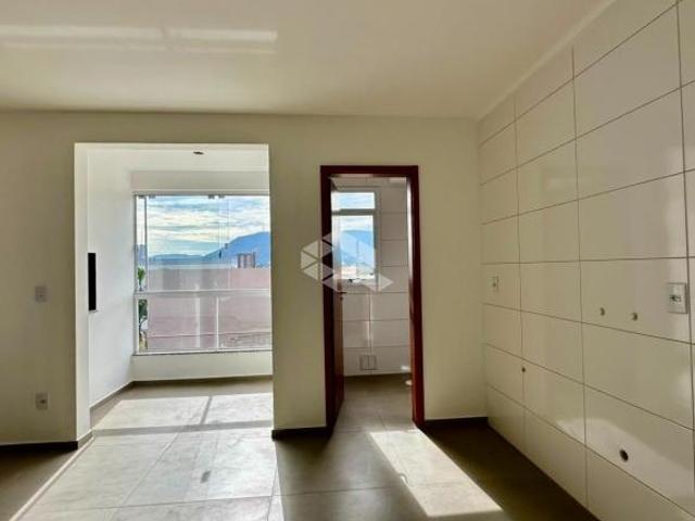 Apartamento 02 dormitorios com sacada e churrasqueira a venda na planta bairro C