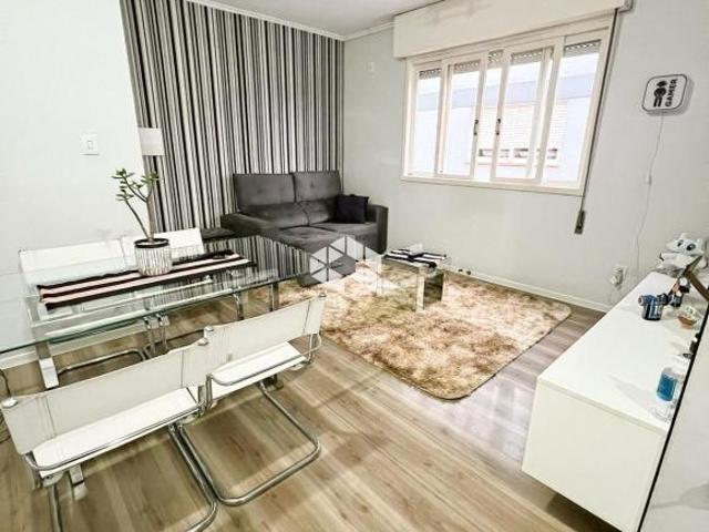 Apartamento 1 Dormitório semimobiliado com elétros, área de serviço, garagem coberta. Nossa Senhora