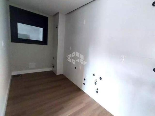 Apartamento 1 dormitório suite e 1 vaga de garagem no Centro de Gramado junto a