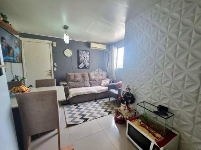 Apartamento 2 dormitórios bairro Olaria com vaga condomínio fechado