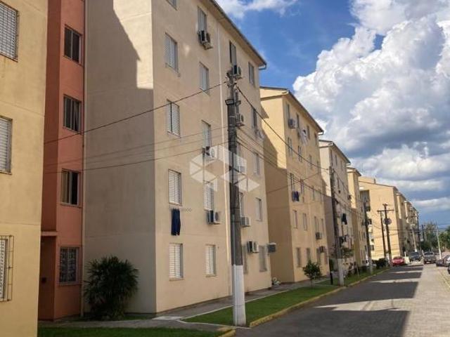 APARTAMENTO 2 DORMITÓRIOS COM VAGA DE ESTACIONAMENTO ROTATIVO