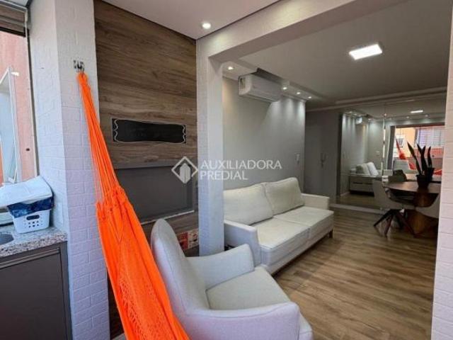 Apartamento 2 dormitorios com suite, sacada e churrasqueirra