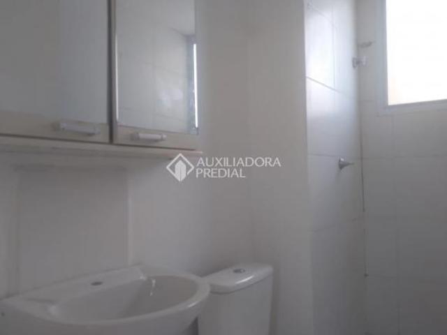 Apartamento 2 dormitórios, sala, cozinha, área de serviço, 1 banheiro, 1 vaga de garagem