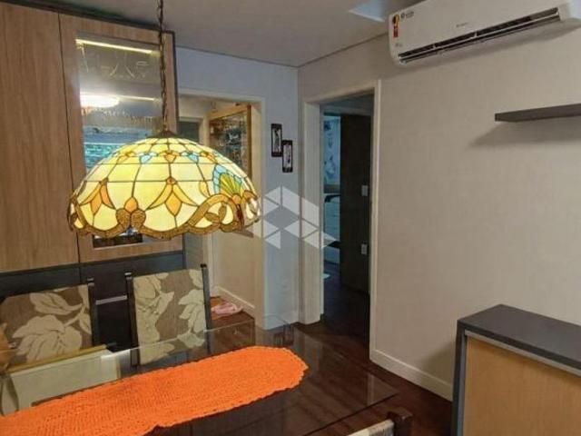 Apartamento 2 dormitórios 58m² 1 vaga no bairro Menino Deus