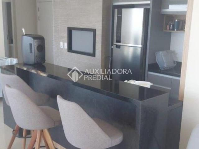 Apartamento 2 quartos com suíte beira da praia em Tramandaí