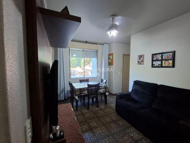 Apartamento 2 quartos,, living, cozinha fica a cozinha mobiliada. banheiro social, área de serviço