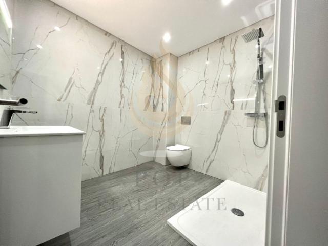 Apartamento T3 novo situado em Olhão, em condomínio privado com piscina, varanda, garagem e arrecadação
