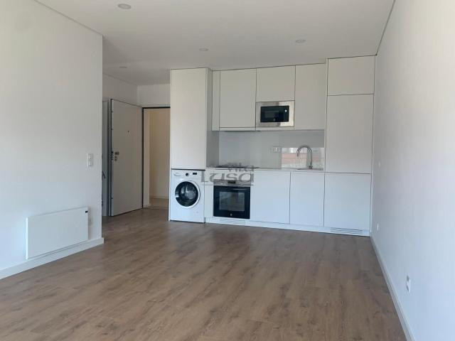 Apartamento T1 novo c/ lugar de garagem e arrumos em Pedrouços a poucos minutos do Polo universitario