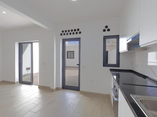 Apartamento T2 + 1 com Quintal em Faro