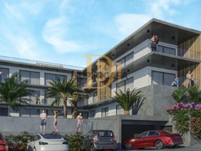 Apartamento T2 novo com varanda, piscina e jardins Premium II, Lazareto, Funchal