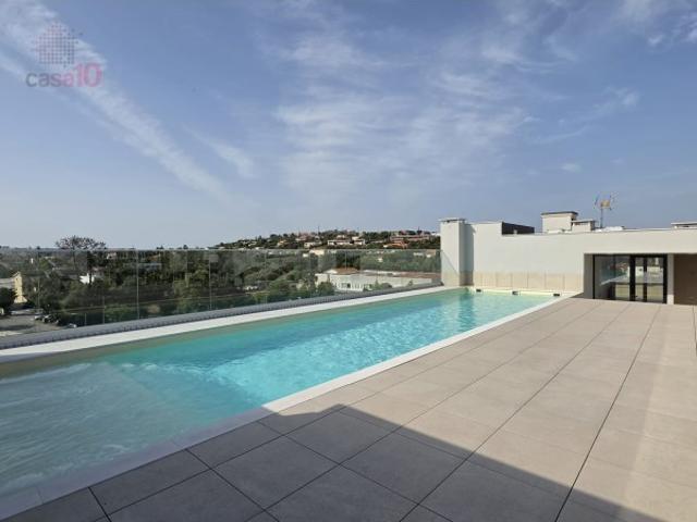 Apartamento T2 novo, com piscina comum, em Fátima