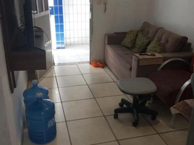 Apartamento térreo com 2 dormitórios na Guilhermina em Praia Grande SP