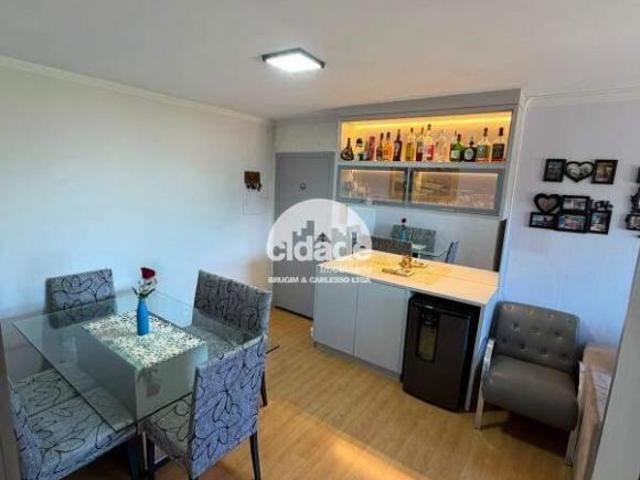 Apartamento térreo à venda no Recanto Tropical, em Cascavel, com 65 m², 2 quartos, móveis, ar condic