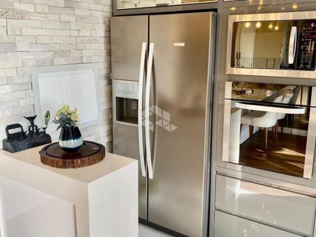 Apartamento totalmente mobiliado no centro de Guaíba em condomínio alto padrão