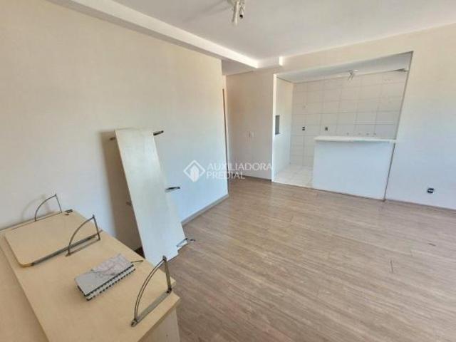 Apartamento à venda no bairro Menino Deus com 03 quartos e 02 vagas