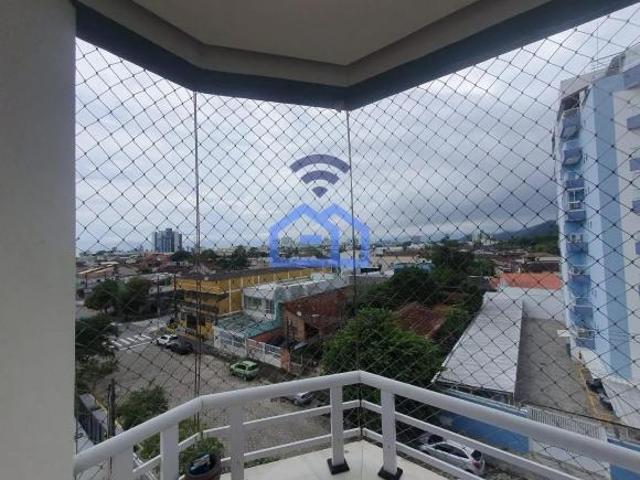 Apartamento à venda no Centro, com 2 dormitórios, uma suíte, sala, área gourmet, piscina Caraguata