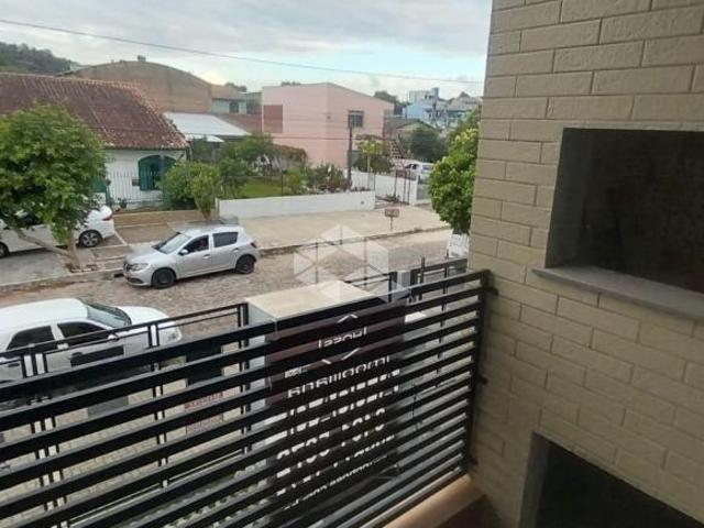 Apartamento à venda, com 2 dormitórios, 1 box garagem, 1 banheiro, sala e cozinha, em condomínio