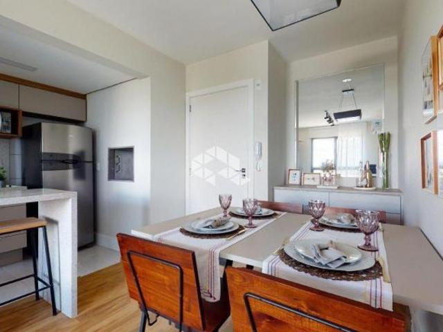 Apartamento à venda com 2 quartos, sendo 1 suíte, 1 vaga/box, bairro Coronel Nassuca, Guaíba/RS