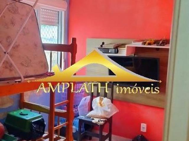 Apartamento à venda em Alvorada RS, bairro Piratini: 2 quartos, sala, banheiro, garagem e 42m² de ár
