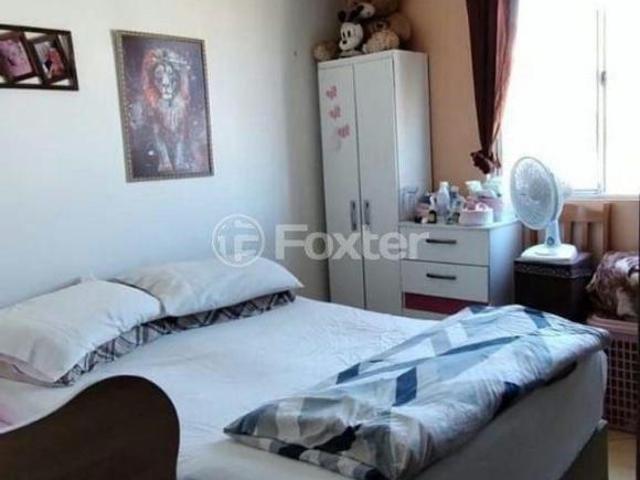 Apartamento à venda em Restinga com 51 m², 2 quartos, 1 vaga