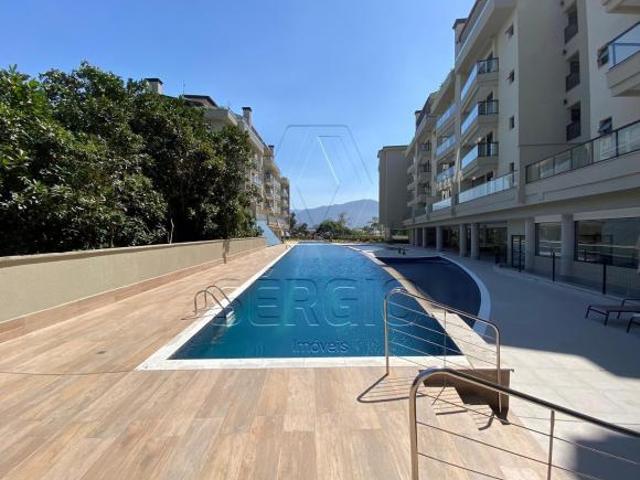 Apartamento à venda em Ubatuba SP, bairro Itagua, 2 quartos, 1 suíte, 2 salas, 1 vaga de garagem, 74