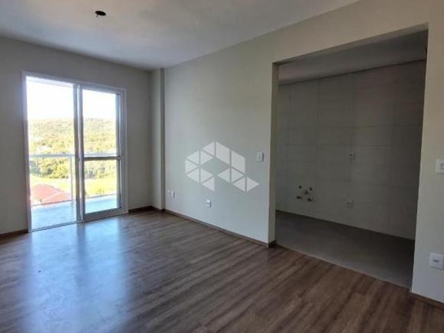 Apartamento central com 01 dormitório e 01 vaga de garagem