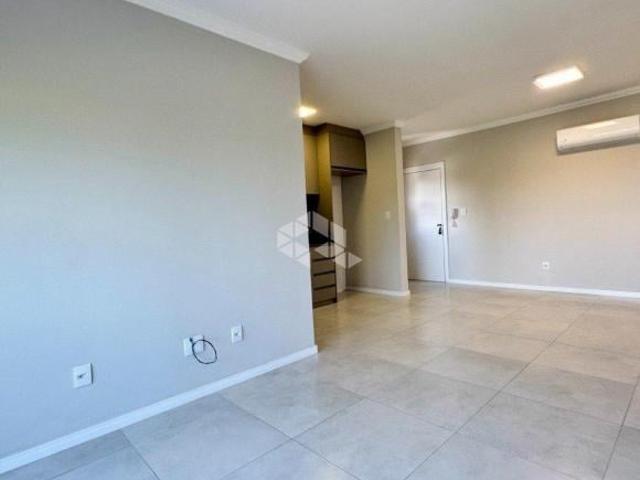 Apartamento central com 02 dormitórios e suíte