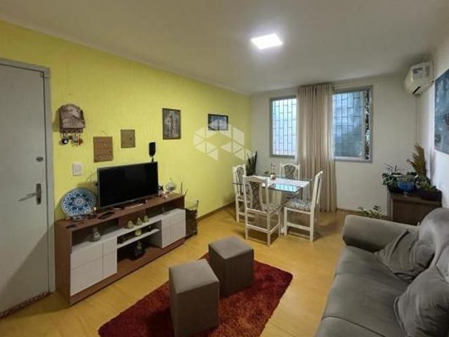 Apartamento central com 2 dormitórios!