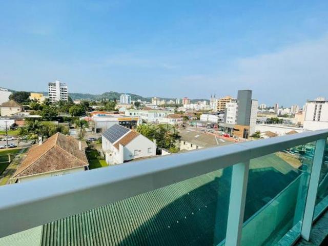 APARTAMENTO CENTRAL COM DOIS DORMITÓRIOS