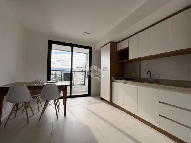 APARTAMENTO CENTRAL DE 2 DORMITÓRIOS COM 1 VAGA