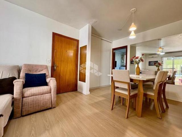 Apartamento central, 2 dormitórios com vaga
