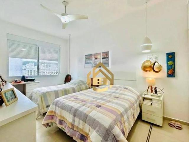 Apartamento com 3 dormitórios à venda por R$ 650.000,00 Praia das Pitangueiras Guarujá/SP