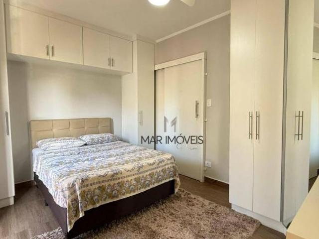 Apartamento com 3 dormitórios à venda, 110 m² por R$ 585.000,00 Praia das Astúrias Guarujá/SP