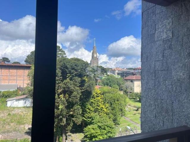 Apartamento com 3 dormitórios no centro de Canela com vista para Catedral de Pedra