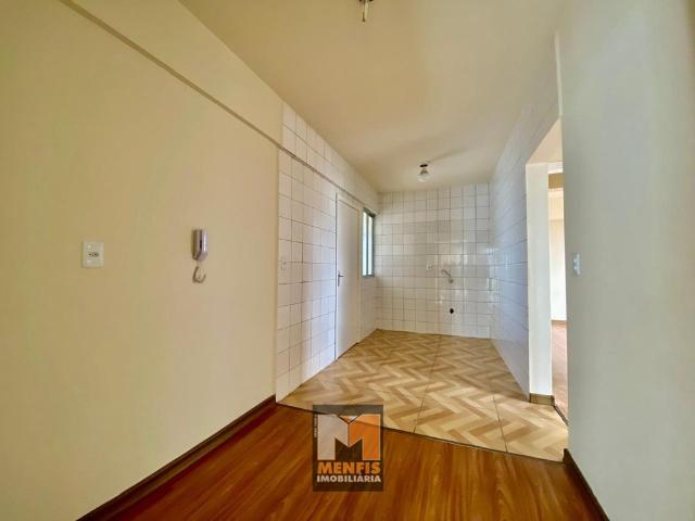 Apartamento com 1 suite + 2 quartos Centro
