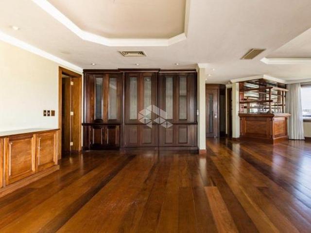 Apartamento com 284 m² privativos, semimobiliado, 3 dormitórios sendo 1 suíte e 4 vagas de garagem n