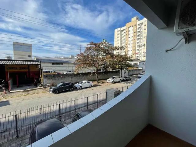 Apartamento com 2 dormitórios, 1 vaga, 50m² área privativa à locação em nossa senhora do rosário